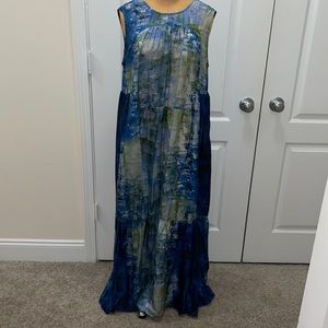 Measurements for size Medium: Length- 56" , Bust- 48"